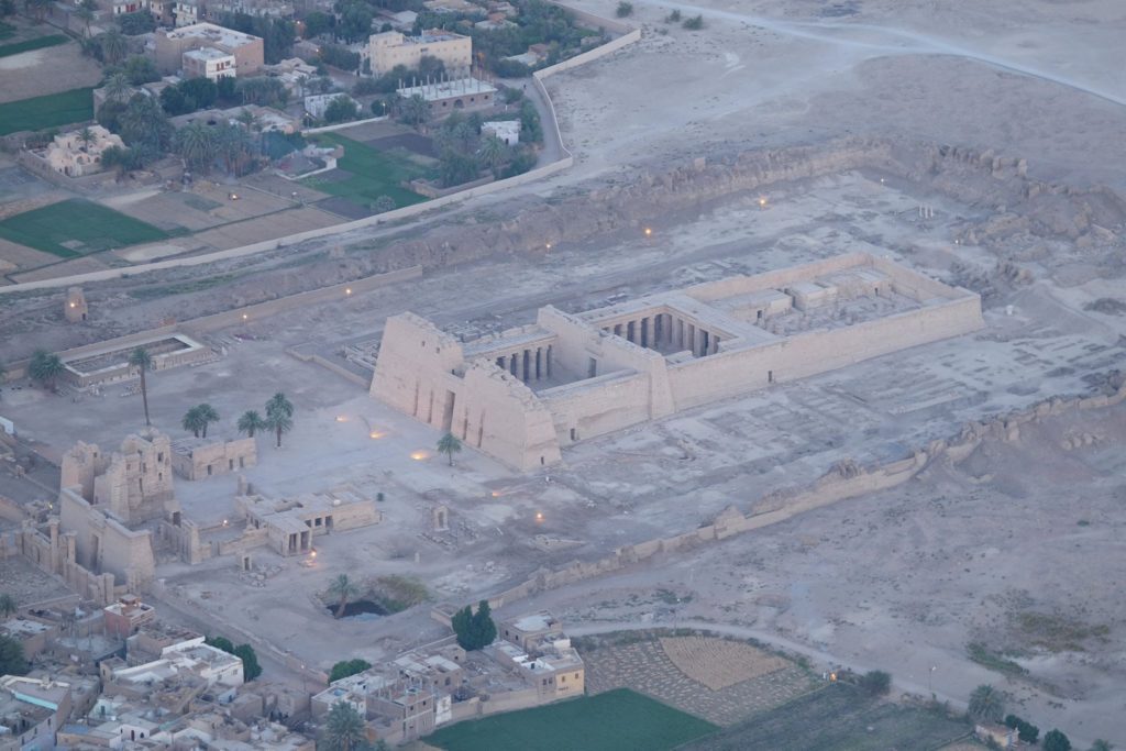 Aerial view of Madient Habu, Rameses III's Mortuary Temple. One of the best preserved temples in Egypt. Photo: Genevieve Hathaway Photography.