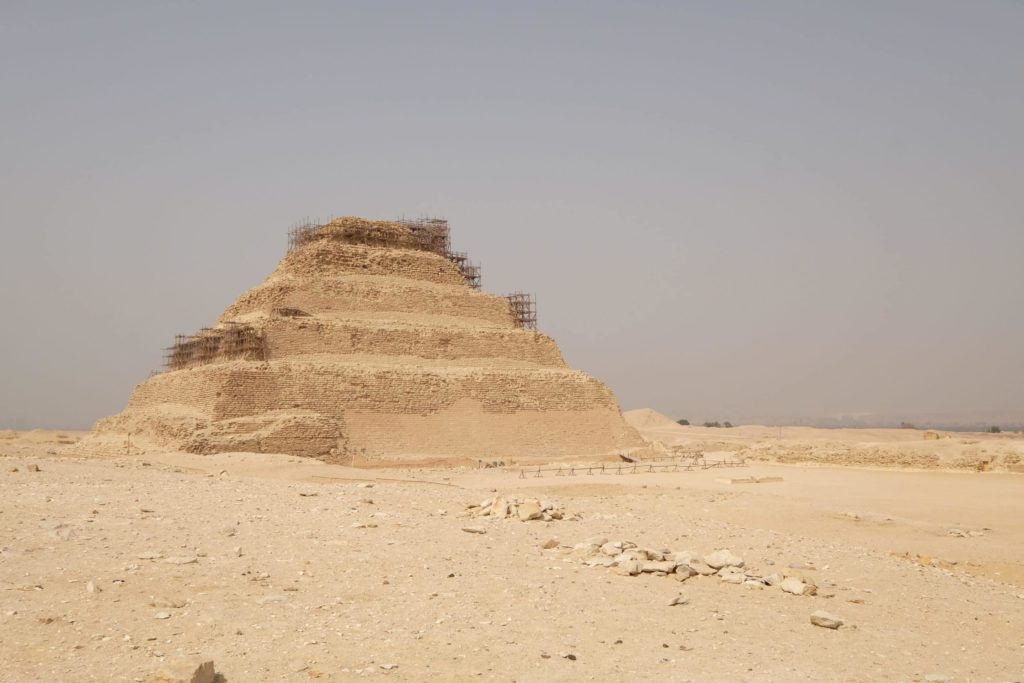Designed the brilliant architect Imhotepl Djoser's Step Pyramid was the first pyramid in Egypt. It shows the transition from a mastaba style tomb to a pyramid tomb. Saqqara. Photo: Genevieve Hathaway Photography.