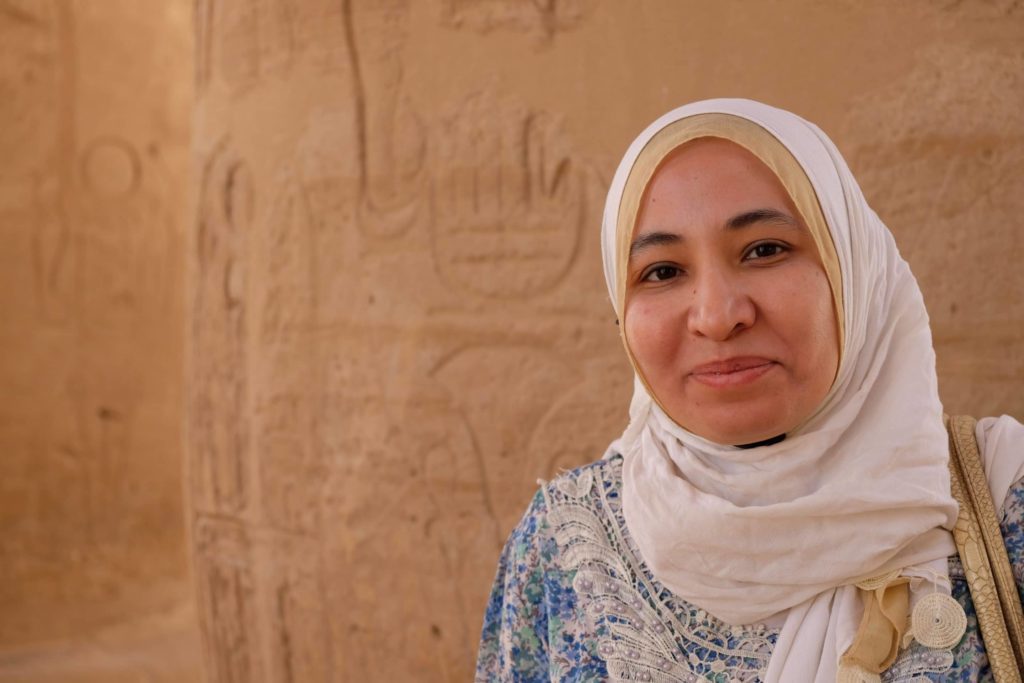 Our fantastic guide Shima helping us understand the unique features of Rameses III's mortuary temple and why it was so important both in terms of ancient Egyptian history, but also architecturally. Photo: Genevieve Hathaway Photography.