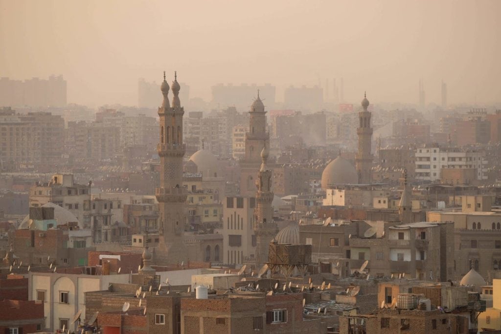 Sunset over Old Cairo. One of Cairo's nicknames is the 'City of a 1,000 Minarets'. In fact, Cairo has more than 1,000 minarets! Photo: Genevieve Hathaway Photography.