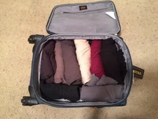 Whether traveling for 2 weeks or a month, Joanie always uses just a small, carry-on sized suitcase. Photo: Joanie Maro.