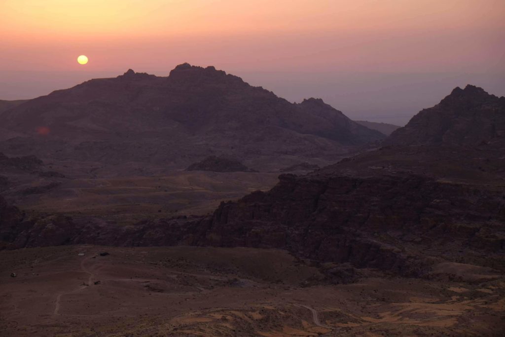 Sunset over the desert around Wadi Musa. The rugged mountains and deep gorges add to Petra and the surrounding area's beauty. Photo: Genevieve Hathaway Photography.