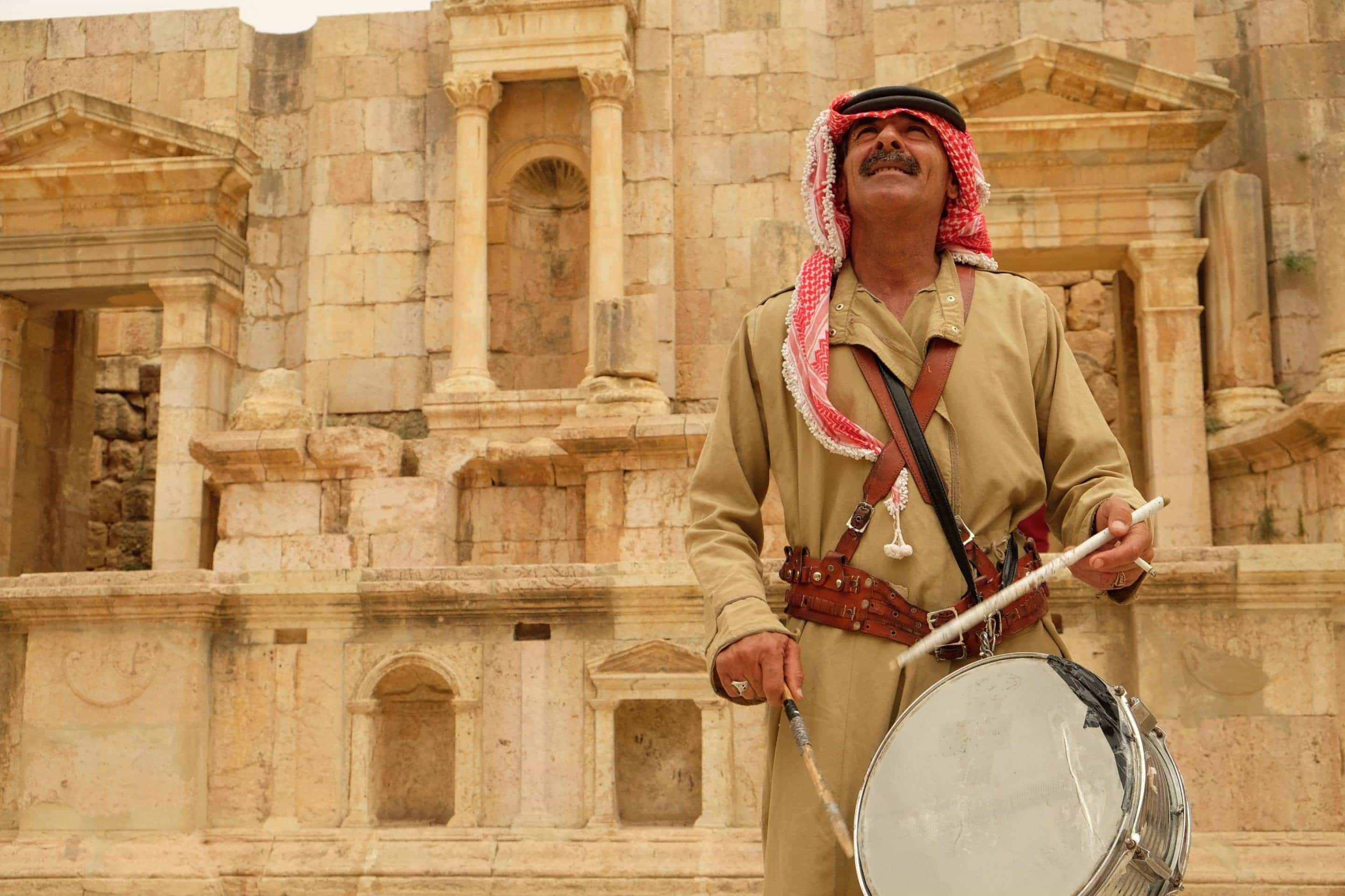 Traditional musicians entertain travelers at Jerash, demonstrating the spectacular acoustics in the amphitheatre. Photo: Genevieve Hathaway Photography.